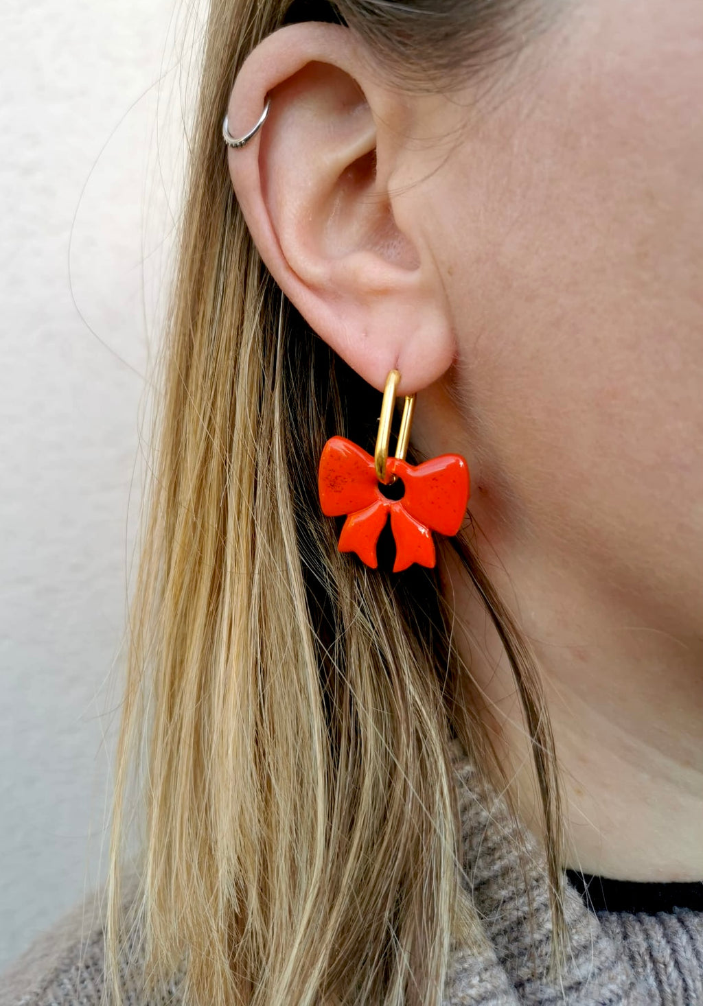 Boucle d'oreille noeux rouge