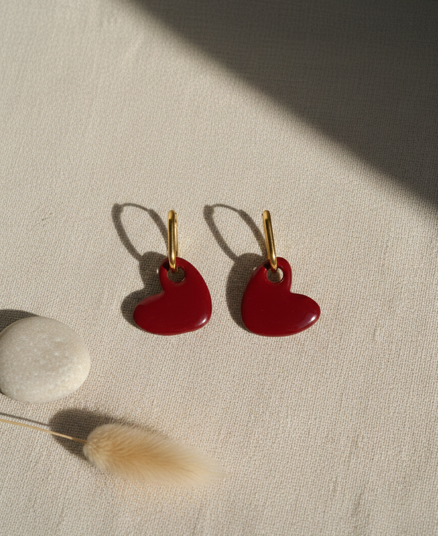 Boucle d’oreille coeur bordeaux avec créole or