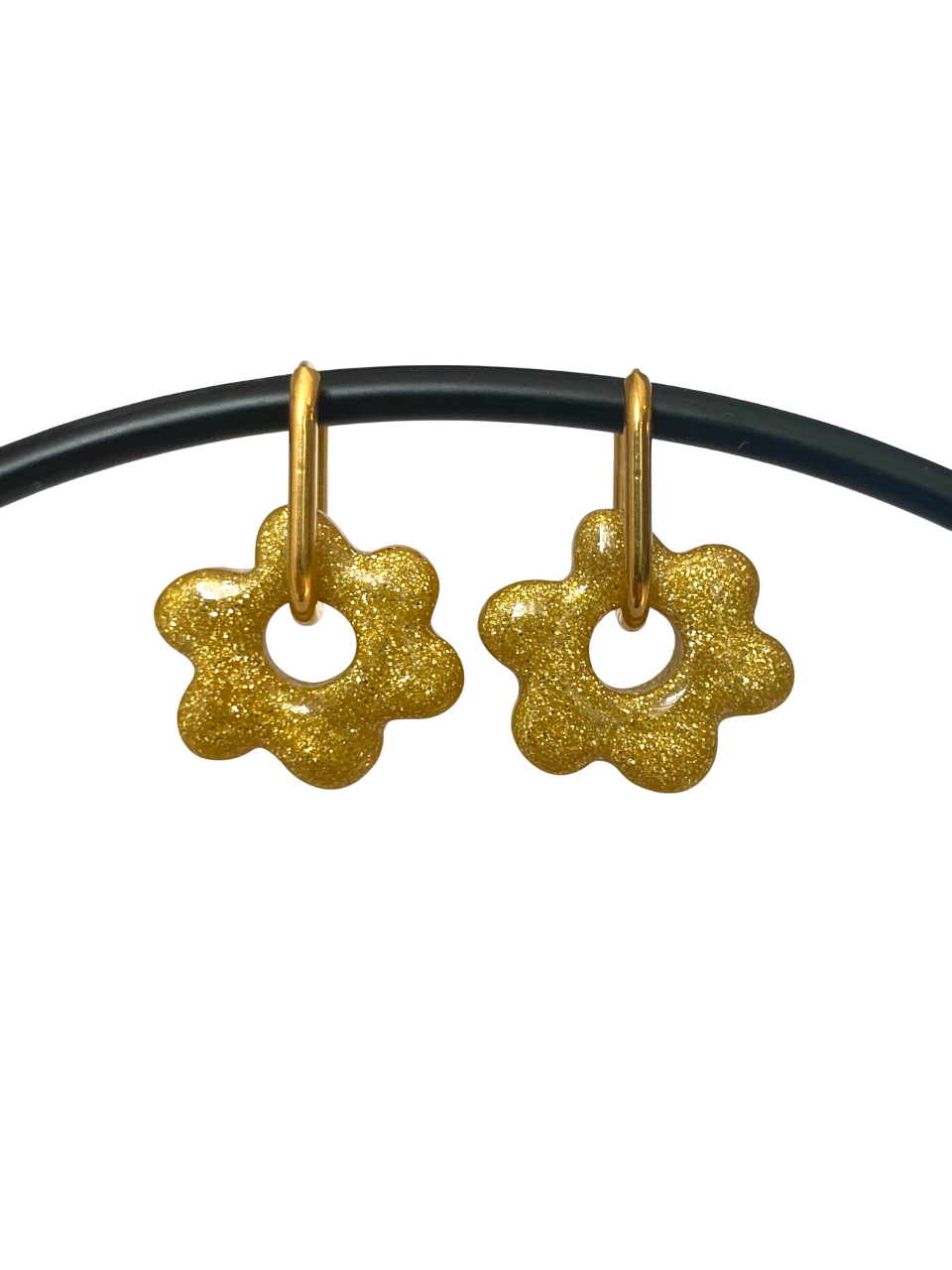 Boucles d'oreilles fleur dorées,