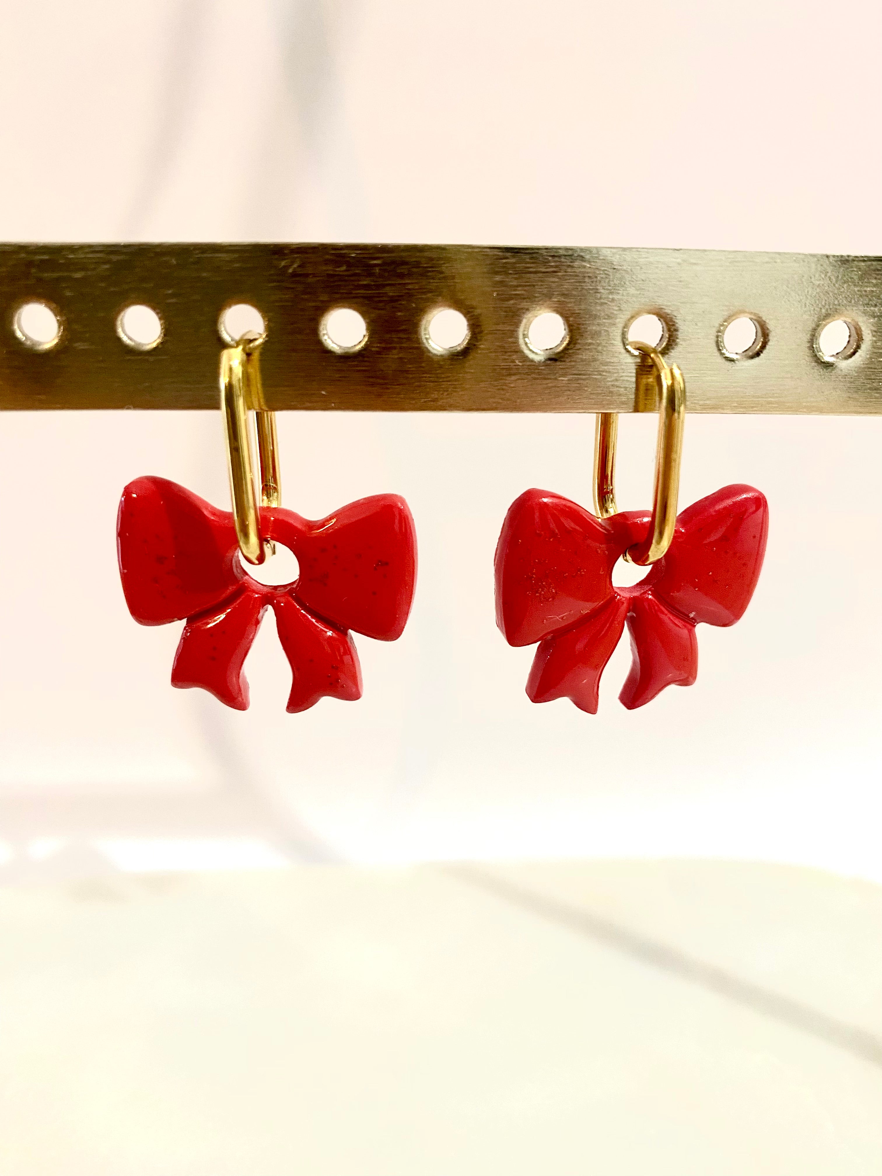 Boucles d’oreilles nœud rouge